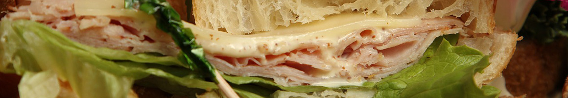 Eating Italian Pizza Sandwich at DiPalma's Restaurant & Pizzeria restaurant in Southbury, CT.
